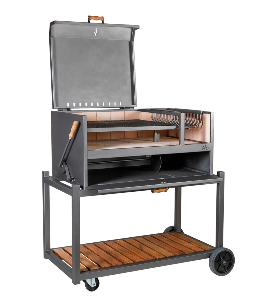Argentinian style charcoal gaucho grill on cart with lid open